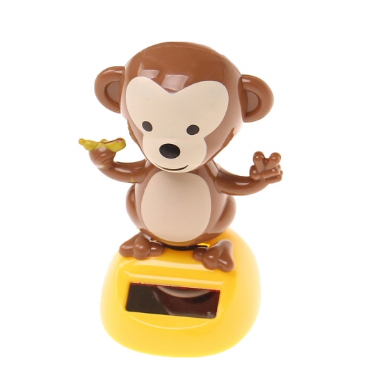 Szoláris táncoló dekoráció majom banánnal