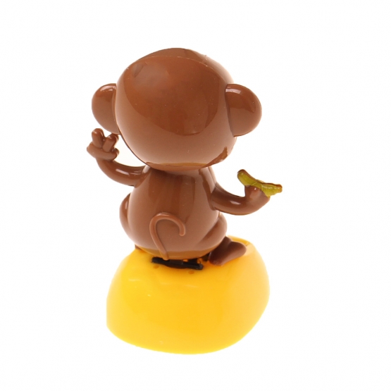 Szoláris táncoló dekoráció majom banánnal